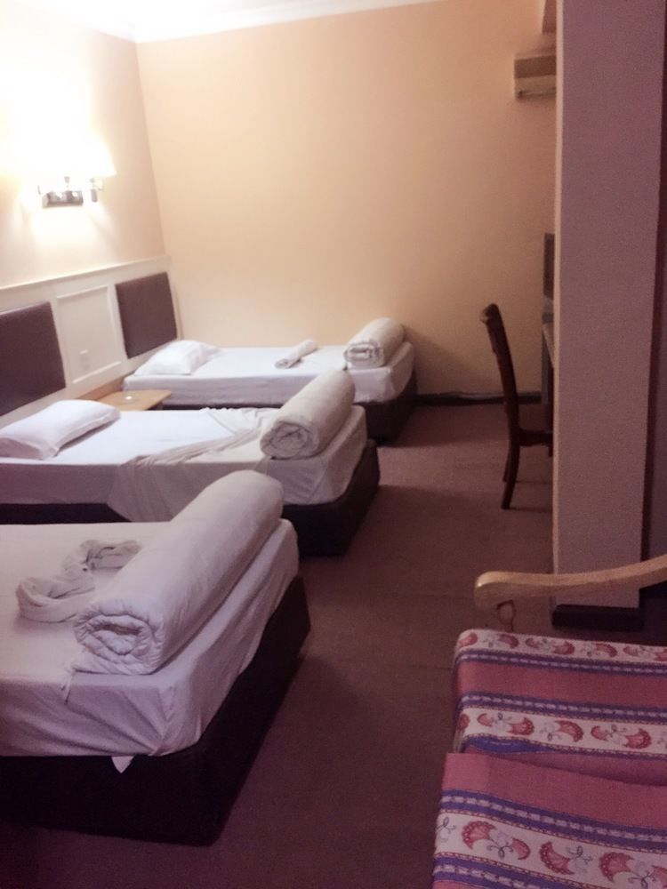 New Yuetan Hotel دار السلام المظهر الخارجي الصورة